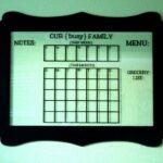 Glass dry erase calendar, a cute way for any busy family to get organized! { lilluna.com }