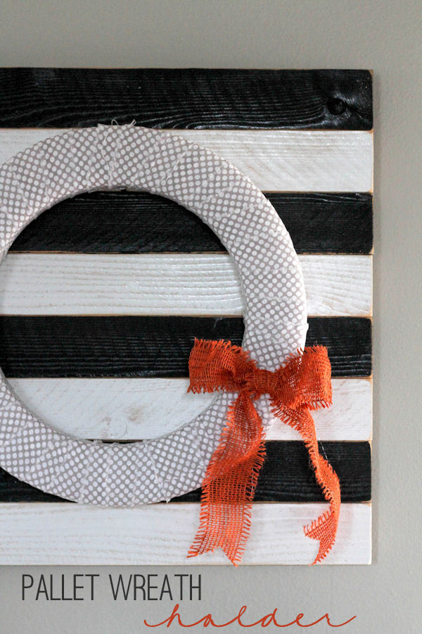 Pallet Wreath Holder and Wreath Tutorial- cute, simple and cheap! { lilluna.com } Few supplies needed - redwood fencing planks, spray paint, polyurethane, nails, and your wreath!