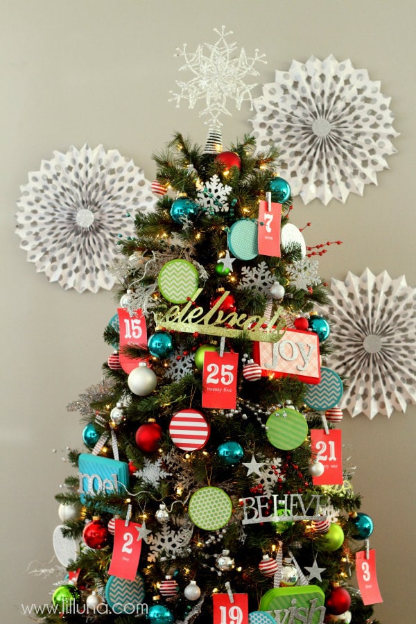 Advent Christmas Tree! The kids will love this! { lilluna.com } Bright & colorful and the kids get a little treat as they pull the numbers off!