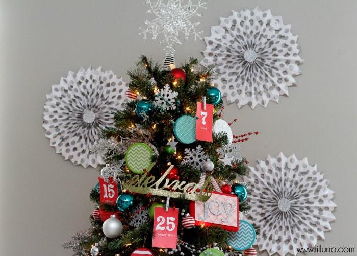 Advent Christmas Tree! The kids will love this! { lilluna.com } Bright & colorful and the kids get a little treat as they pull the numbers off!