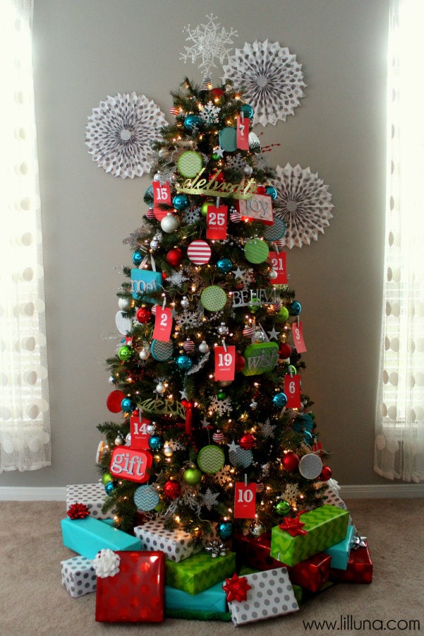 Advent Christmas Tree! The kids will love this! { lilluna.com } Bright & colorful and the kids get a little treat as they pull the numbers off!