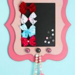 Adorable Framed Magnetic Bow Holder tutorial on { lilluna.com }