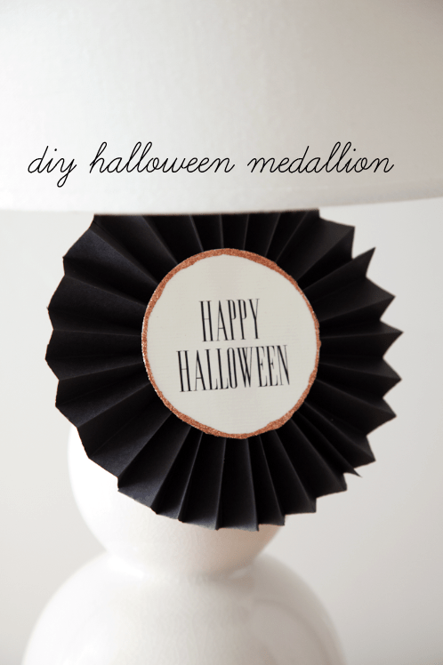 DIY Halloween Medallion Tutorial on { lilluna.com } Grab your paper, glue, & ribbon and you're set to make this cute medallion.