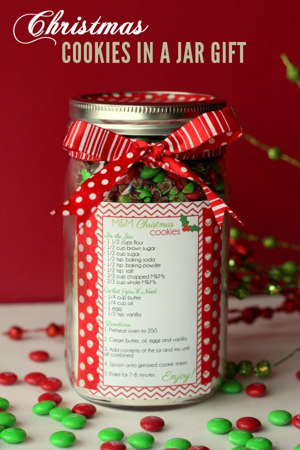 Christmas Cookies in a Jar - Cute and Easy gift idea! All you need is your cookie ingredients, recipe, scrapbook paper, & ribbon!