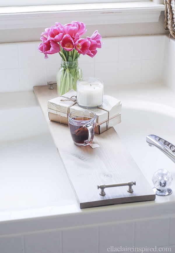 This easy DIY bathtub tray is perfect for drink or your favorite book while you soak! Tutorial on { lilluna.com } All you need is some pine board, stain, cabinet pulls, and sandpaper.