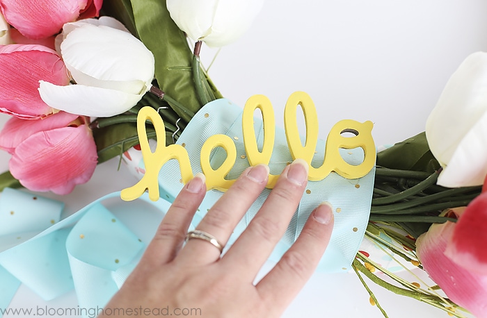 BEAUTIFUL (and simple) Hello Spring Wreath tutorial - this is the perfect craft to make and display on your front door or in your home.