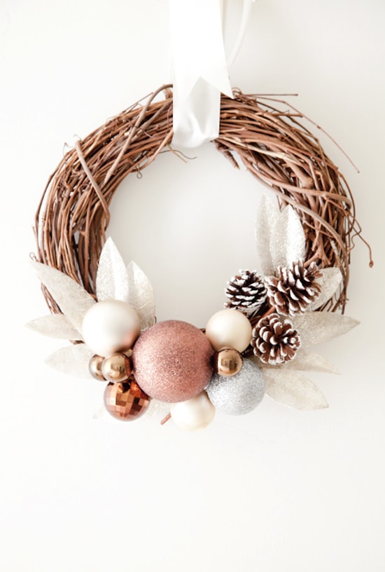 Beautiful DIY Holiday Wreath with ornaments and pine cones - so pretty! Tutorial on { lilluna.com }